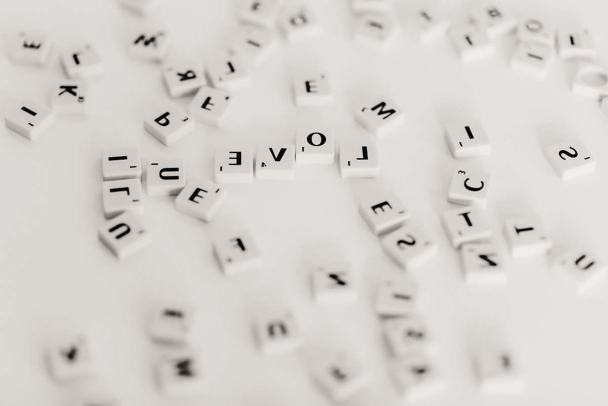 computer hardware shallow focus photo of scrabble pieces computer